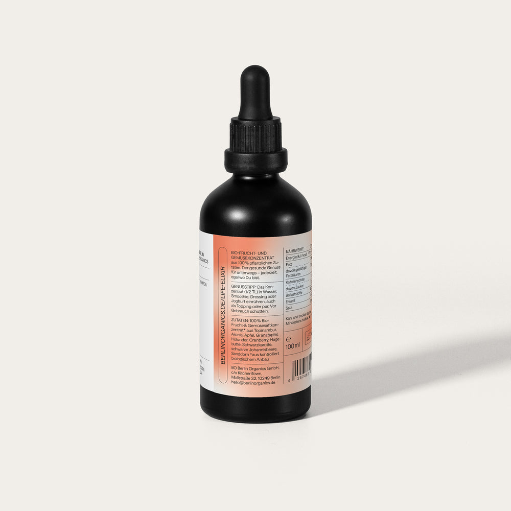 Schwarze Tropfflasche mit Berlin Organics Bio-Extrakt und Produktinformationen.